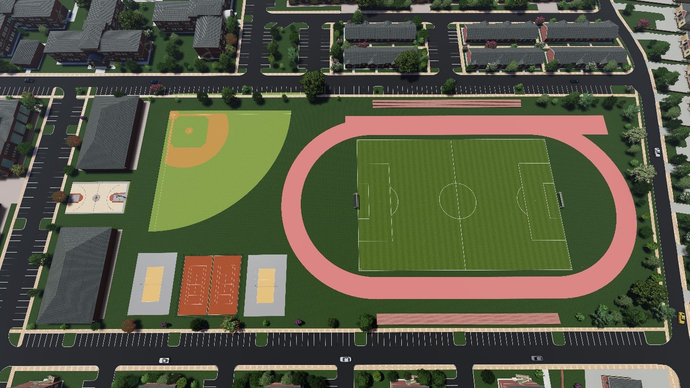 Aerial view of the campus sports complex showing a running track and football pitch, baseball field, tennis and basketball courts, and surrounding parking